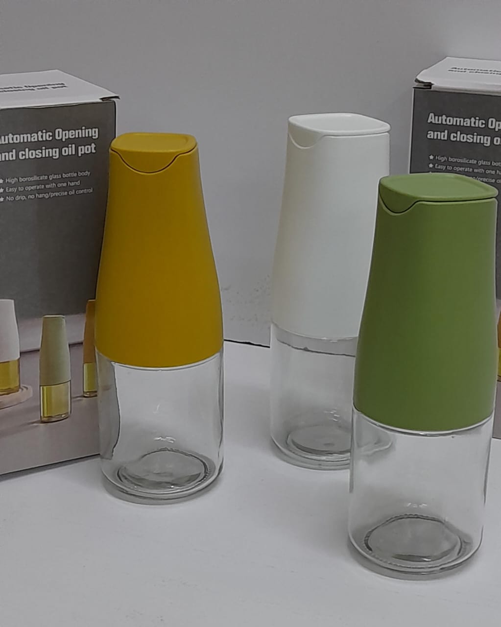 Automatic oil dispenser