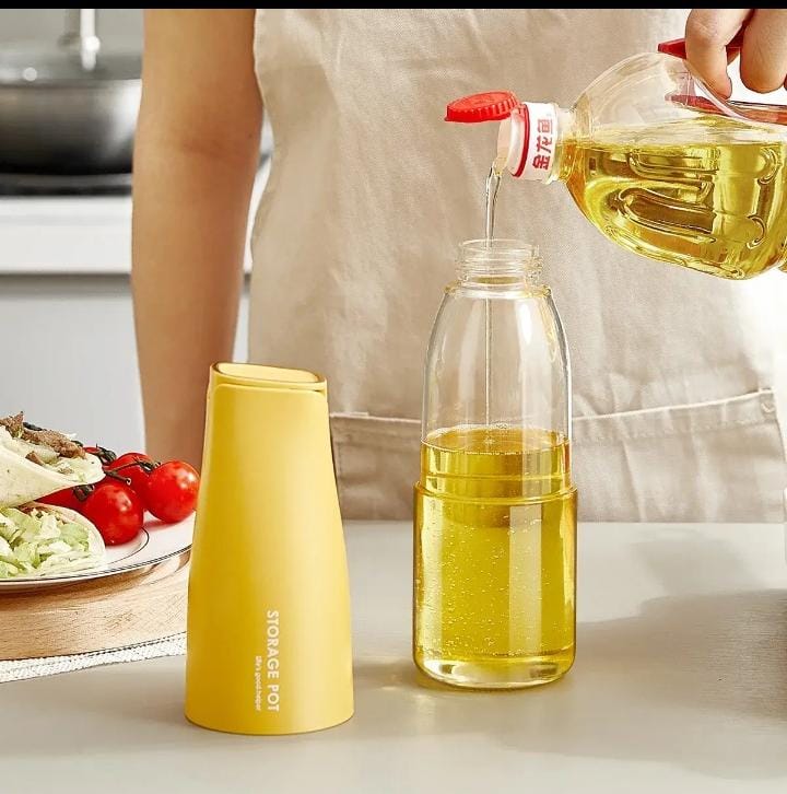 Automatic oil dispenser